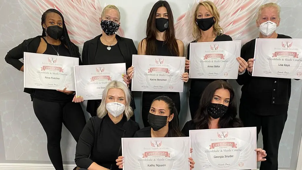 Beauty Angels Academy students holding Microblade and Shade course certificates